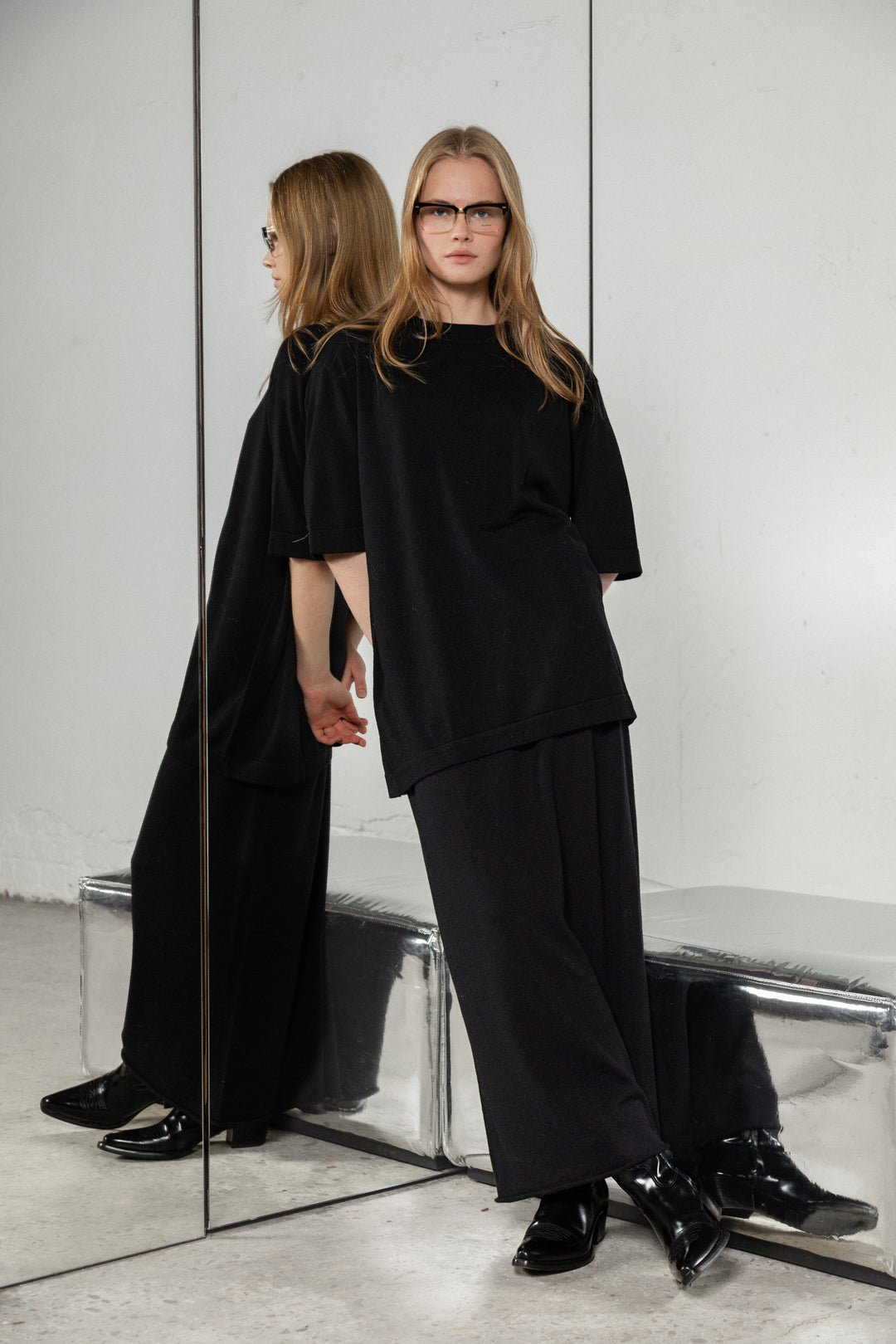 BLACK SHEER-KNIT EXTRA FINE MERINO WOOL MIDI SKIRT