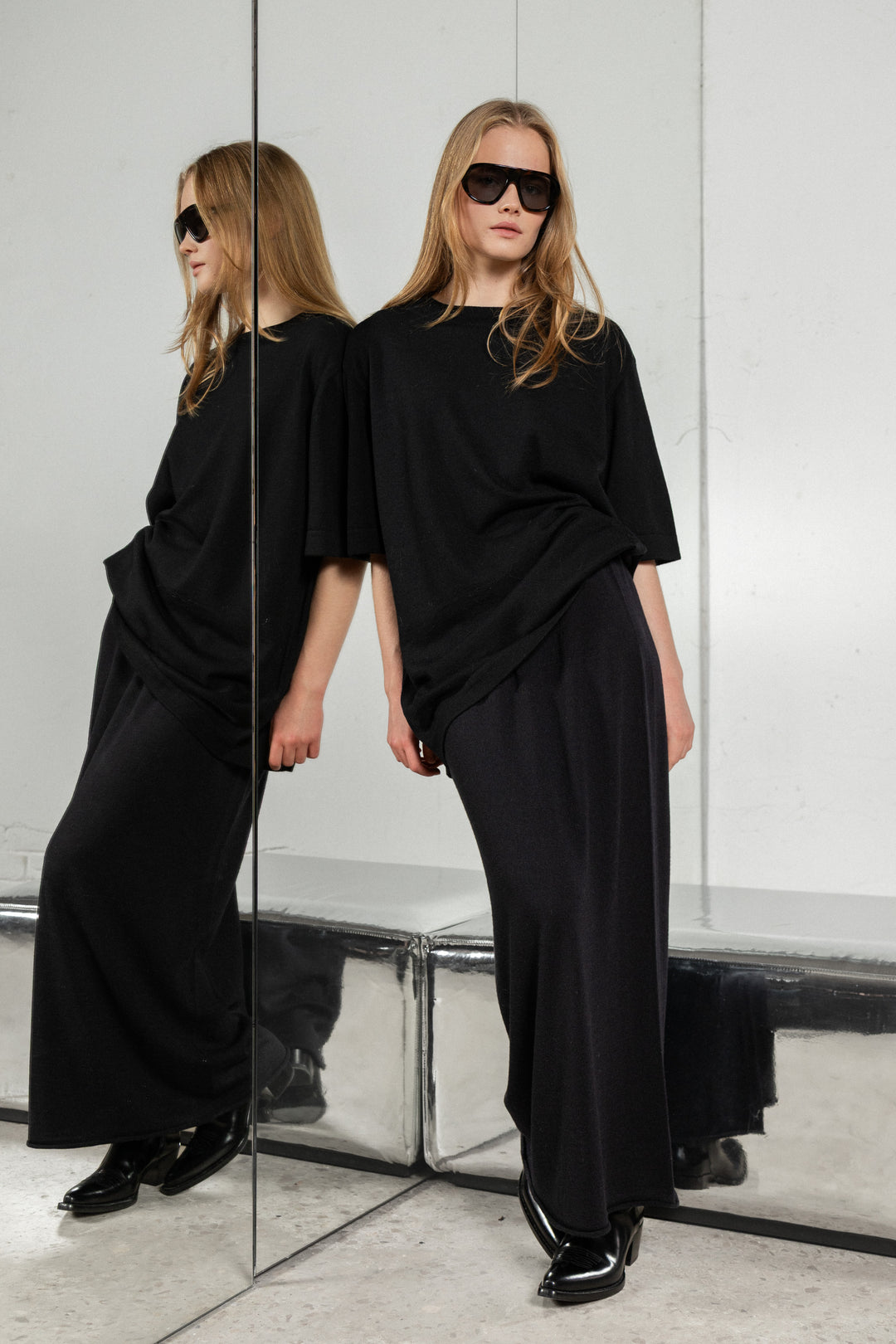 BLACK SHEER-KNIT EXTRA FINE MERINO WOOL MIDI SKIRT