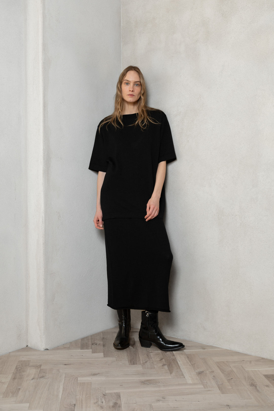 BLACK SHEER-KNIT EXTRA FINE MERINO WOOL MIDI SKIRT