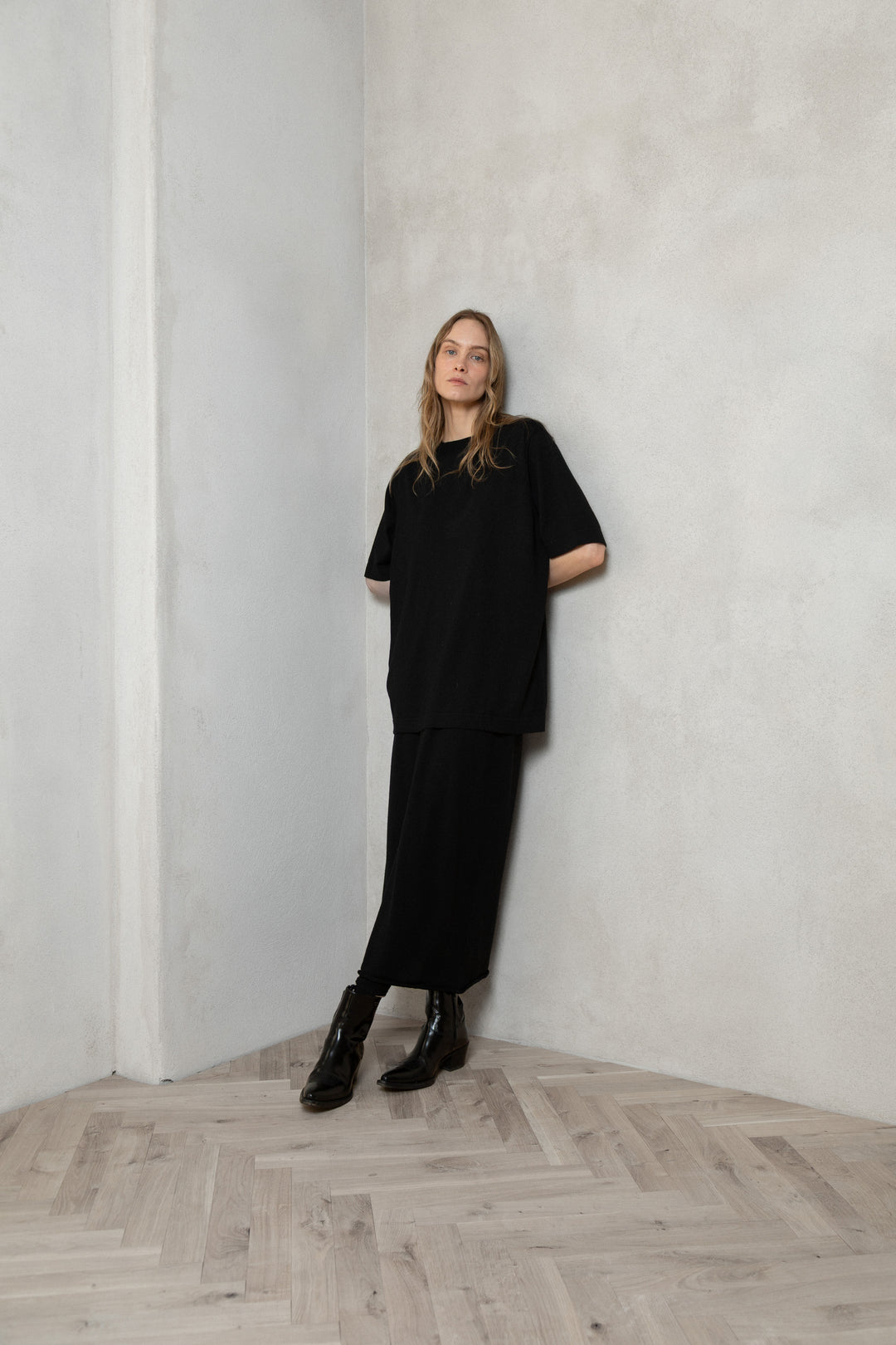 BLACK SHEER-KNIT EXTRA FINE MERINO WOOL MIDI SKIRT