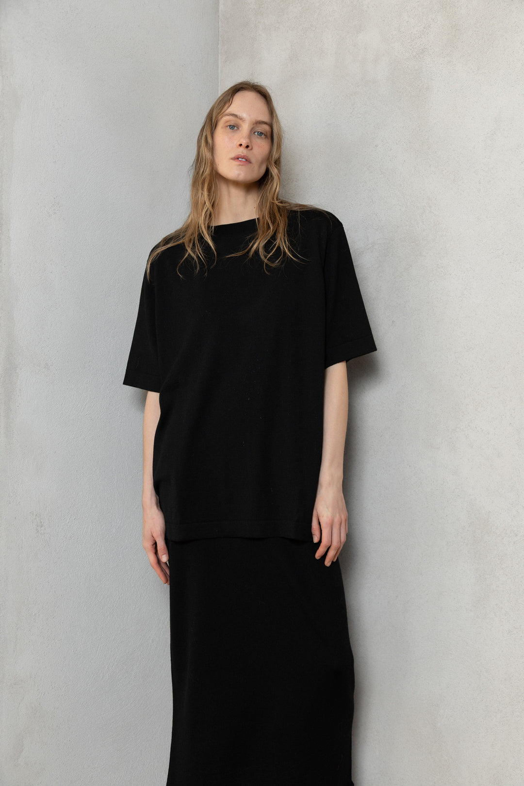 BLACK SHEER-KNIT EXTRA FINE MERINO WOOL MIDI SKIRT